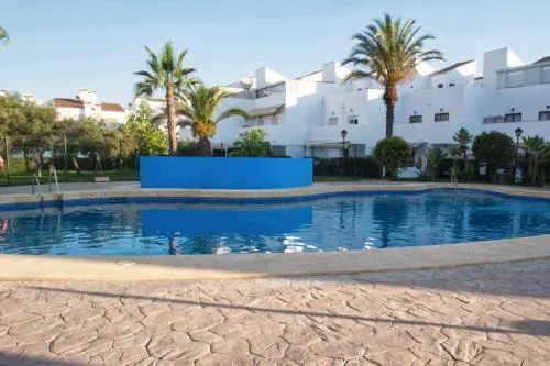 Adosado en playa Vera,3 piscinas