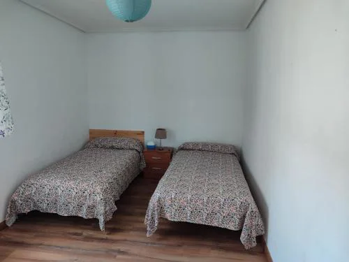 Acogedora habitación privada en piso familiar con baño compartido