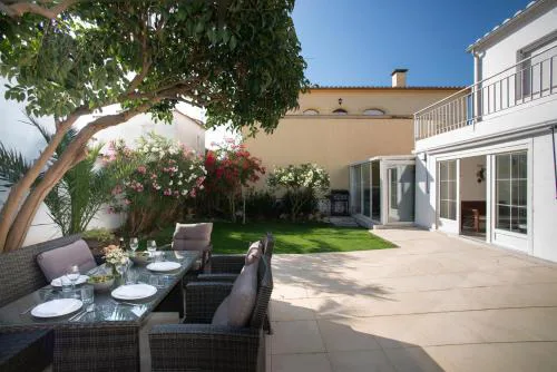 WELCS CASA ADOSADA 313 EMP con jardin privado