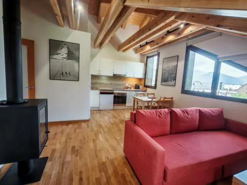 Chimenea y cocina moderna, encanto rústico con confort - Aüt 3
