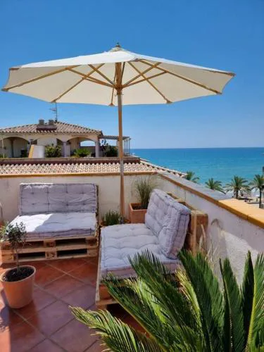 Cal SalMaré seafront apartment with rooftop terrace and pool