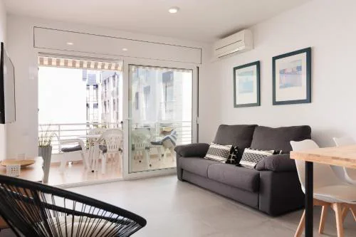 Lets Holidays WHITE APARTMENT with TERRACE, AC, PARKING, NEAR BEACH