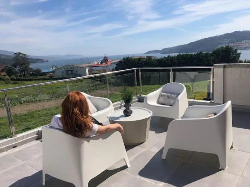 A Neida Casa con terraza con vistas al mar