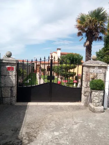 Casa con jardín en primera línea de playa