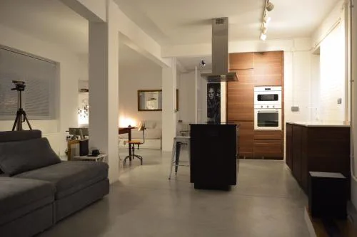 Loft industrial con Cine y Diseño