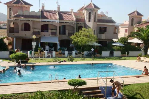 Precioso dúplex con piscina, en 1ª linea de playa