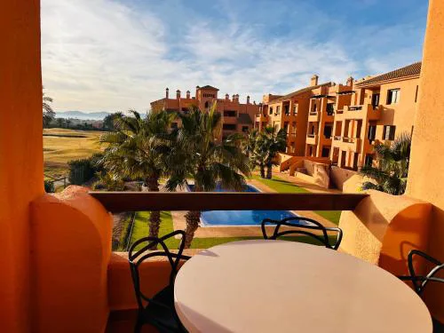 Modern 2-bedroom apartment with best golf views & pool