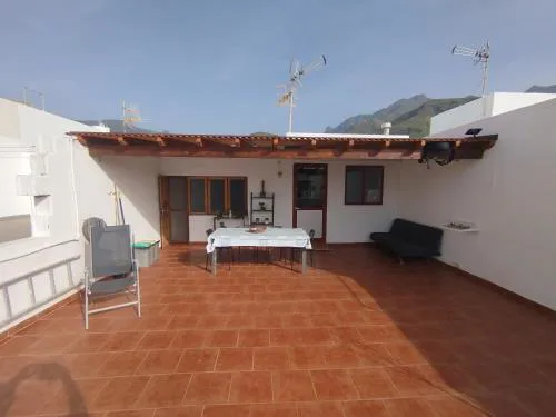 Susa and Pepe garden and house