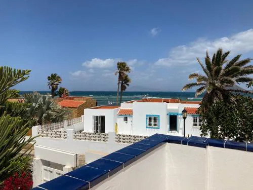 Beach house with the heated pool next to Rocky Point
