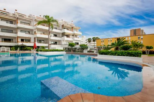 One-bedroom Apartment With Terrace, Pool and Partial Sea Views
