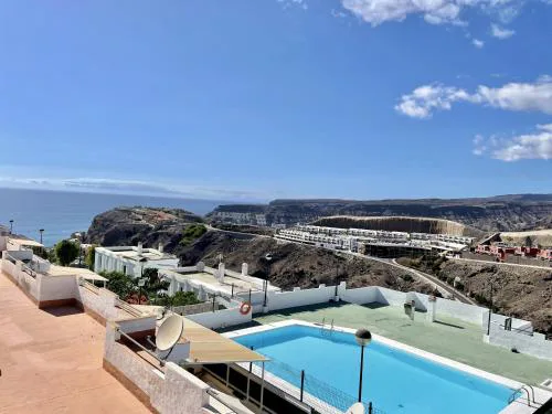 HomeForGuest Amplio apartamento con piscina y terraza en Mogan