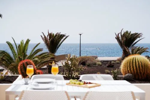 Coastal Apartment with Terrace, Sea Views and Heated Pools