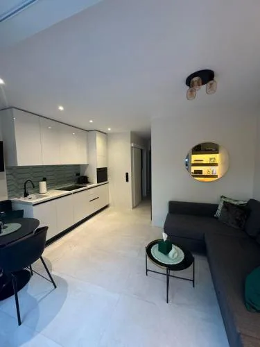 Cosy apartment with shared pool and garden