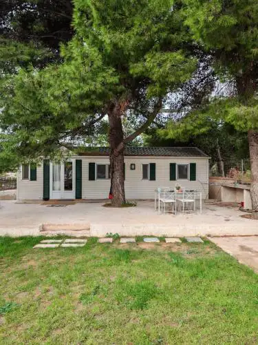 Family mobile home solar powered near the sea and the airport