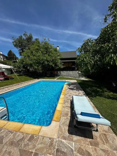 Wooden cottage with private pool near to sea