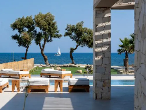Artemis Villa, Beachfront Retreat with Heated Pool, By ThinkVilla