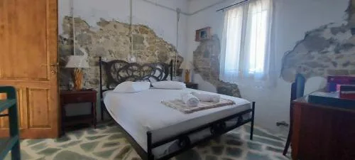 Efi Sudios- Authentic Stone House