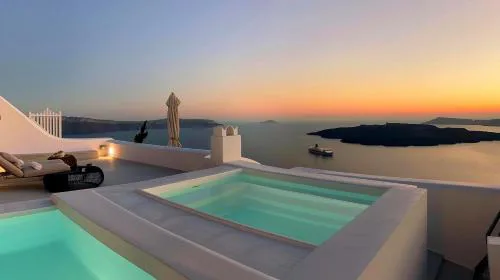 Fira cycladic guesthome with infinity pool and sea views