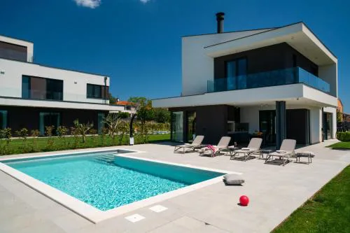 Villa Arestea near Pula with heated pool, sea view, wellness & playground