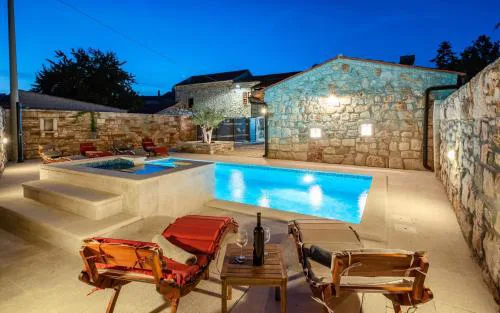 Rustic stone holiday house with pool