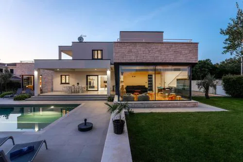 Villa Anni for 10 people in Porec with heated pool, sea view & kids room and playground