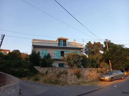 Apartments with parking space Senj - 23402