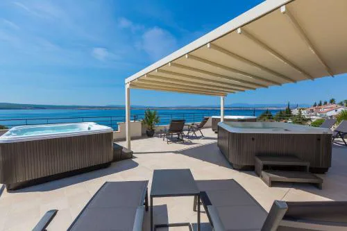 Bezauberndes Studio nur 100 Meter zum Strand mit Sauna, Whirlpool, Meerblick, WiFi