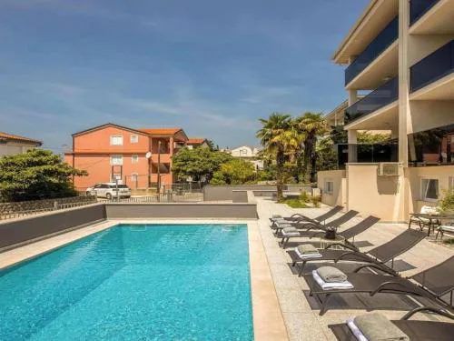 Modern home with balcony and swimming pool
