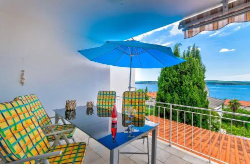 Modernes Apartment nur 350 Meter zum Sandstrand mit Meerblick, eigenem Liegestuhl, Grill