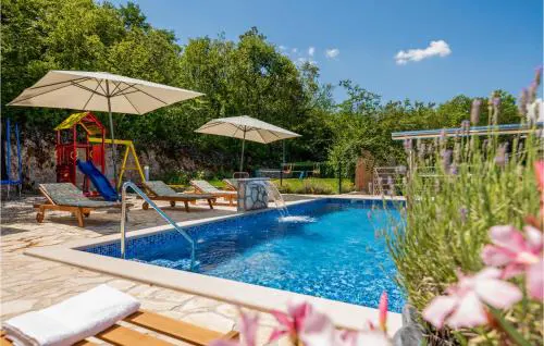 Four-Bedroom Holiday Home In Grubine