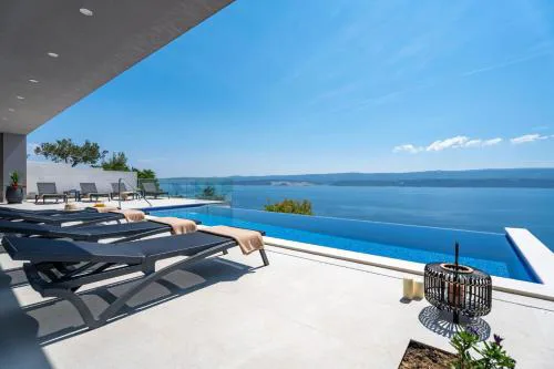 Villa Admira Maria with a heated pool and sea views