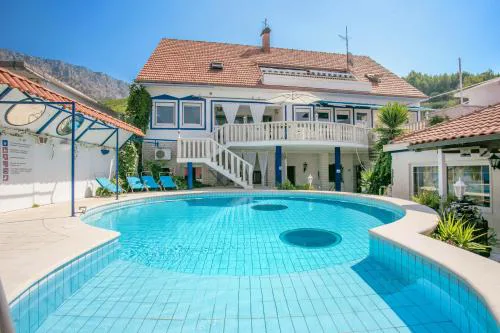 Family-friendly apartments with swimming pool Sumpetar, Omis - 21633
