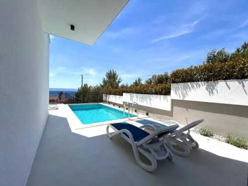 Apartment Petar with pool and sea view