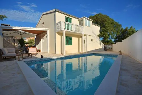 Holiday house with a swimming pool Pozorac, Trogir - 15565