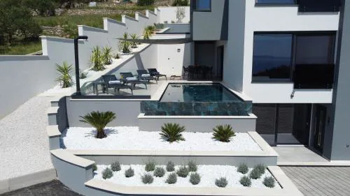 Spectacular villa X with heated pool overlooking Split and sea