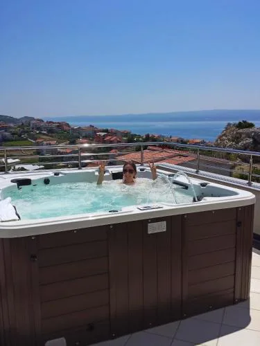 Villa Arya with heated swimming pool, roof hot tub, sauna and gym near the beach