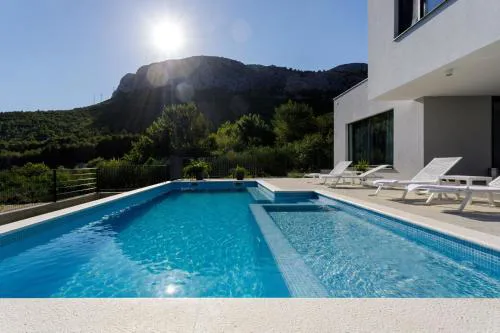 Modern Villa Elia with 40sqm heated pool, 3 bedrooms, and Split city views