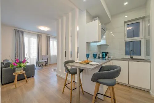 CAPITAL Apartments and Rooms