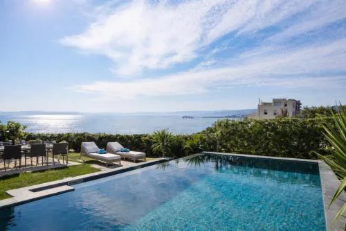 New luxury apartment with PRIVATE Heated POOL and amazing terrace with seaview