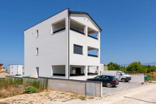 Apartments with a parking space Vir - Lozice, Vir - 23514