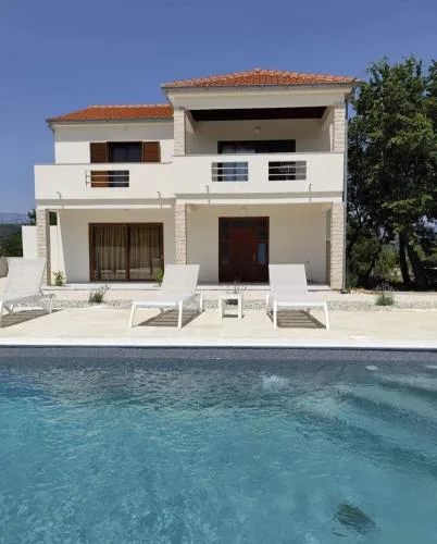Family friendly house with a swimming pool Posedarje, Novigrad - 23578