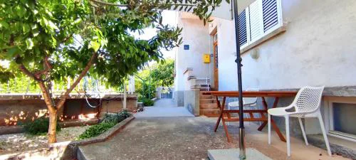 Apartment Vega with private garden, terrace and garage