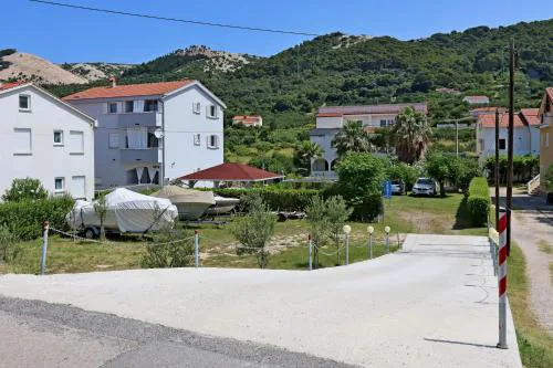Apartments with parking spaces Barbat, Rab - 24547