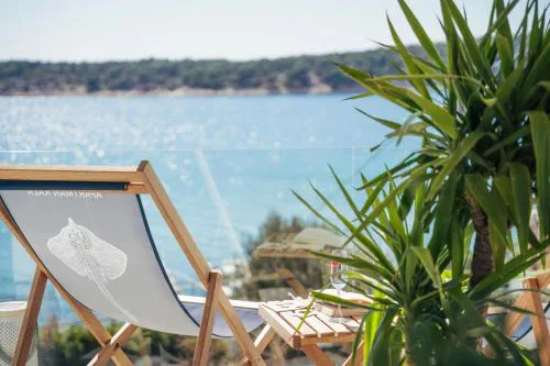 Raža - Beachfront Apartment on Rab - Sea View & Private Boat Dock