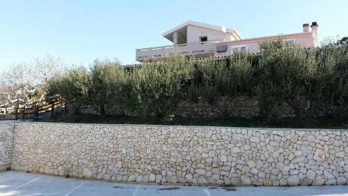 Apartments with parking space Kolan, Pag - 16482