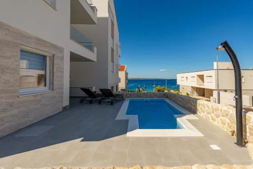 Dolphin view with a pool by the beach