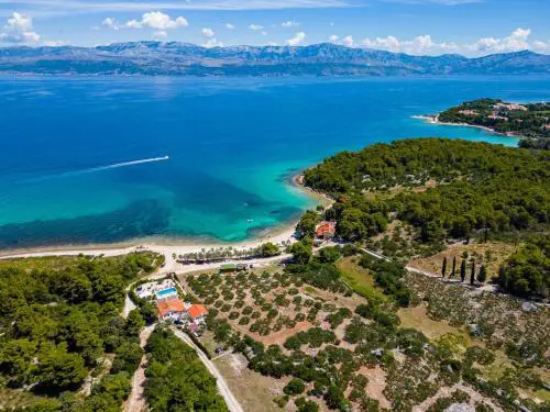 Beachfront House Mir with private pool and jacuzzi right at the beach in beautiful bay in Mirca - Brac