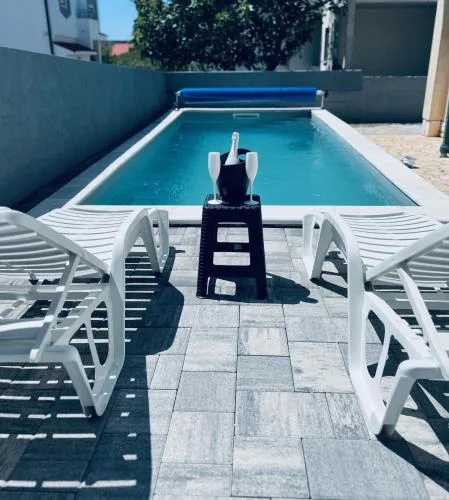 Sun n' Fun Apartments with Pool