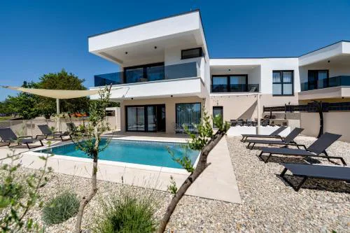 Villa Mirakul, new modern villa with swimming pool, close to the beach, children playroom, quiet area- by TRAVELER tourist agency Krk - ID 2680