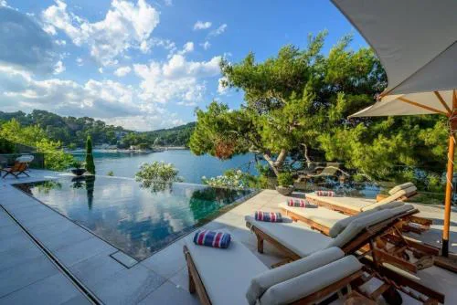 Luxury Seafront Villa Prestige Brac with private pool, sauna and gym and private sea deck at the beach on Brac island